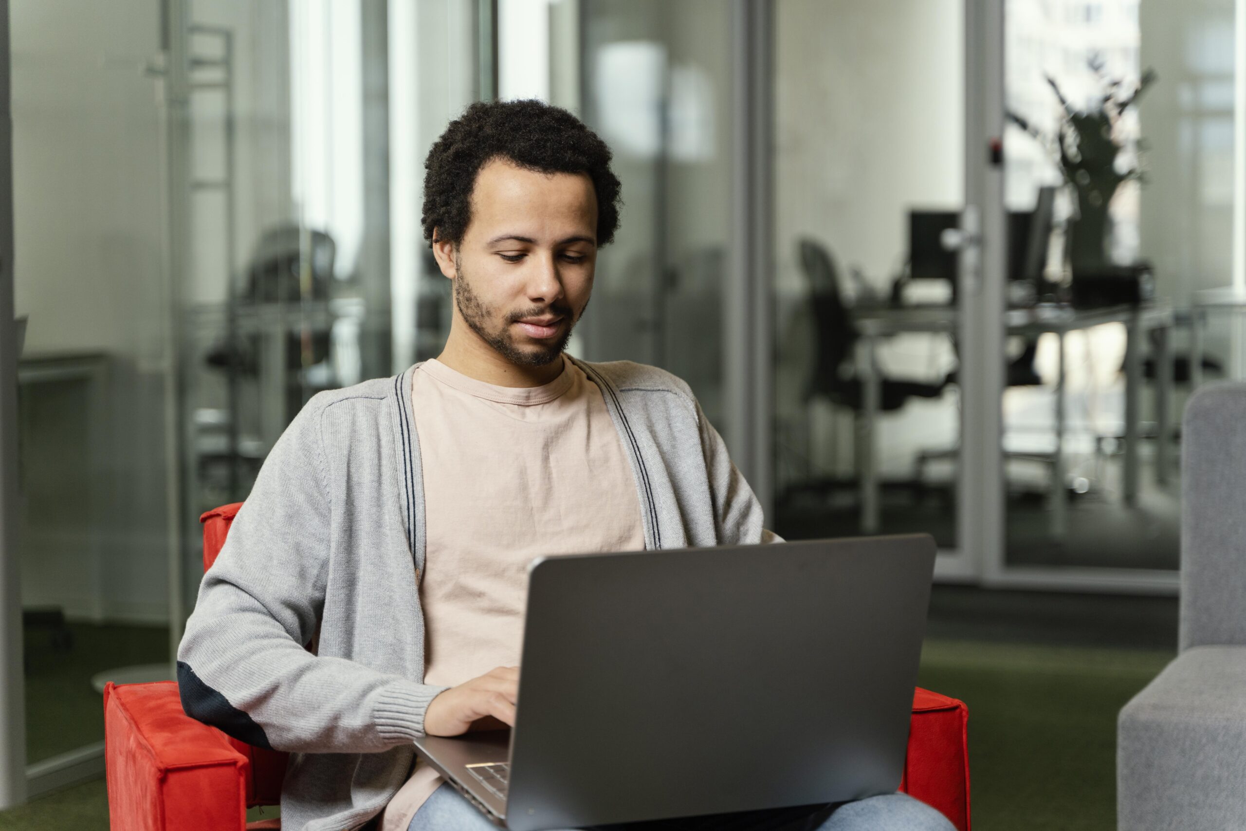 man-working-laptop-company-scaled.jpg